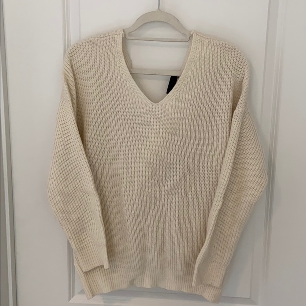 Worn once Vinci dolls sweater with twist back
